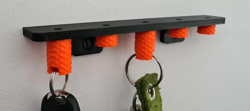 Key rack with magnetic hangers