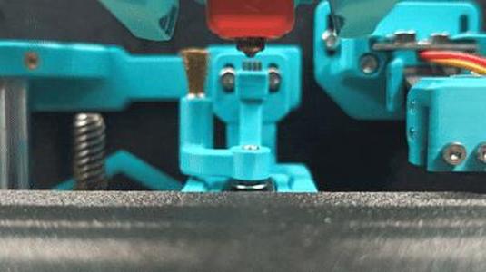 Ender 3 NG v1.2 discard bucket with motorized brass and silicone brushes