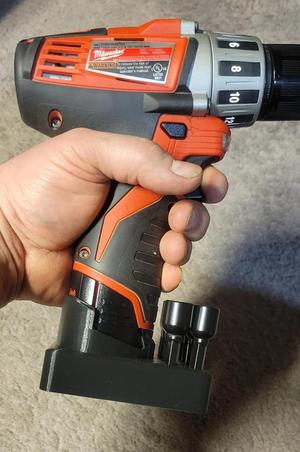 Milwaukee M12 Battery, Bit Caddy and stabilizer
