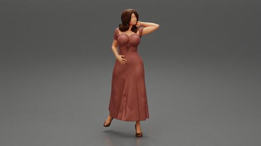beautiful tanned woman wearing an elegant dress posing standing