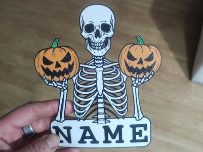 SKELETON WITH PUMPKINS-YOUR NAME