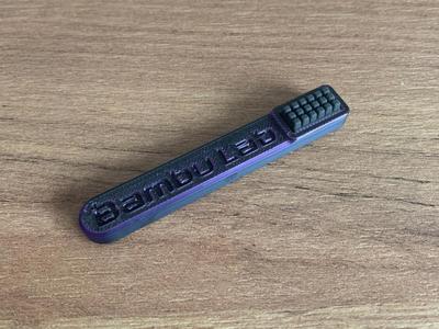 Nozzle cleaner brush