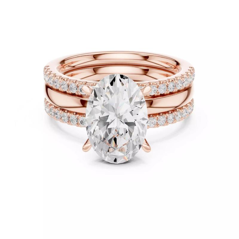 Three Piece Ring Set Oval Cut Solitaire with Round Pave Bands