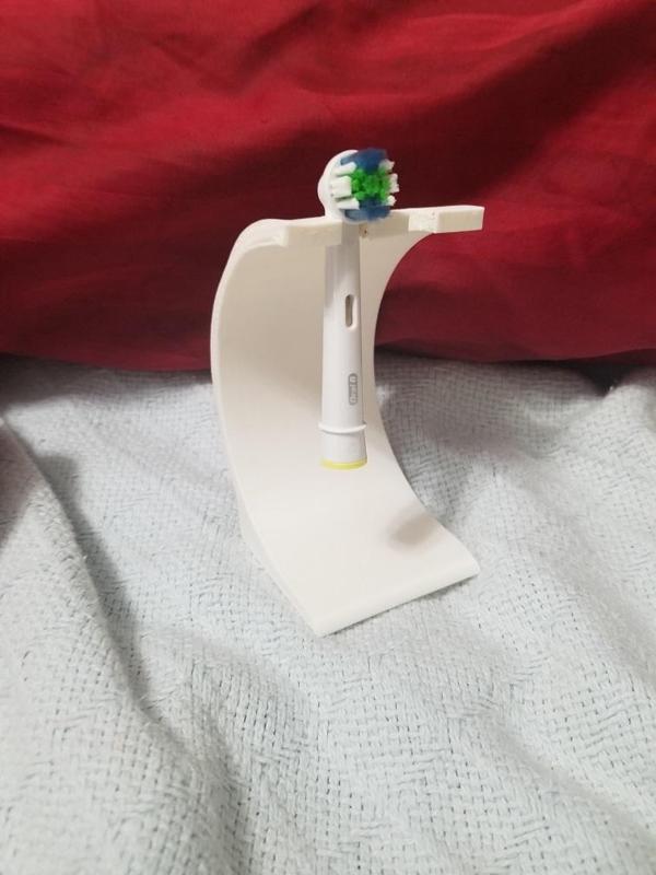 Better toothbrush head holder