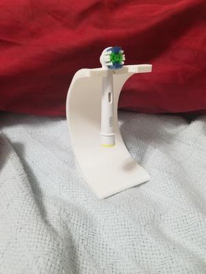 Better toothbrush head holder