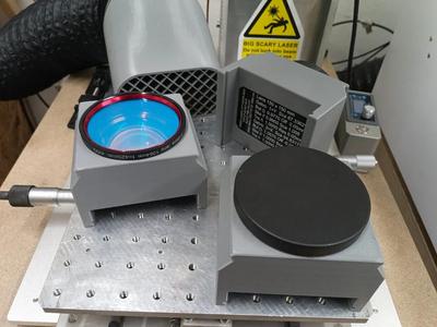 Stackable fiber laser lens holder   