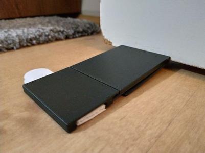 Step-to-release doorstop