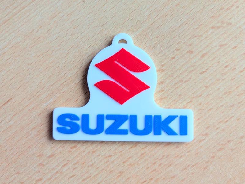 Suzuki logo keychain with text