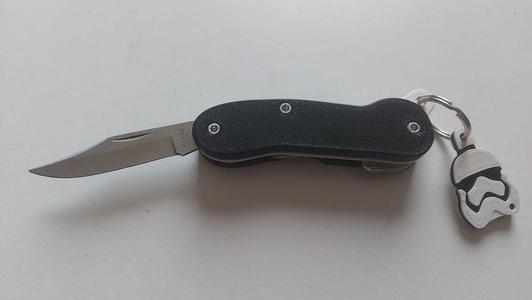 Key holder with knife