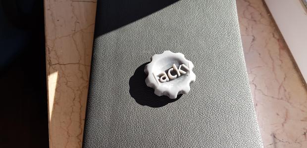 Dog tag with name and number