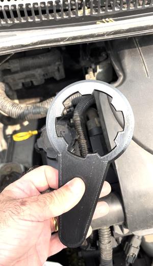 Wrench for unscrewing engine oil cap C1