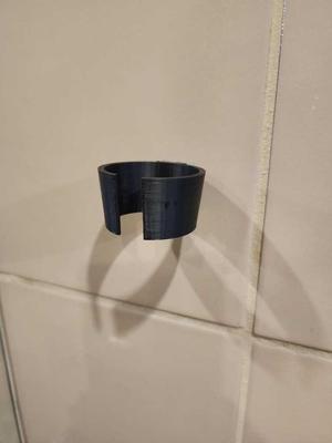 Wall-mounted razor or hair clipper holder