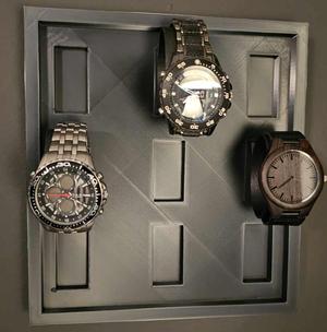 Watch display wall mountable holds 9 watches.