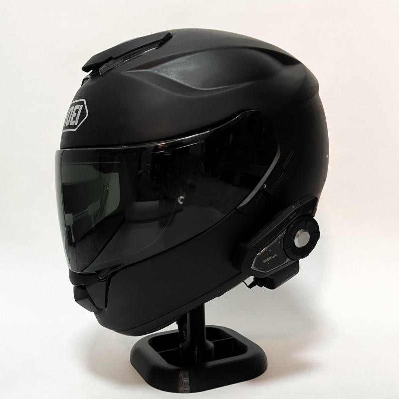 Motorcycle helmet holder