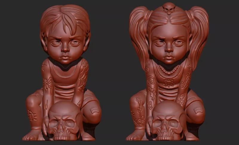 sculpture of twins