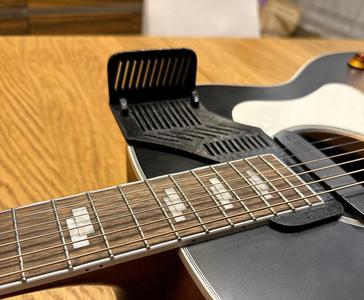 Phone holder mount for a guitar