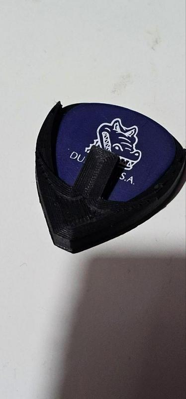 Adhesive guitar pick support