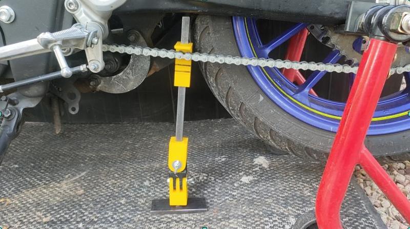 easy motorcycle chain tension control