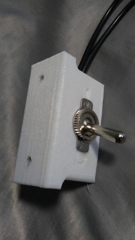 Toggle switch holder