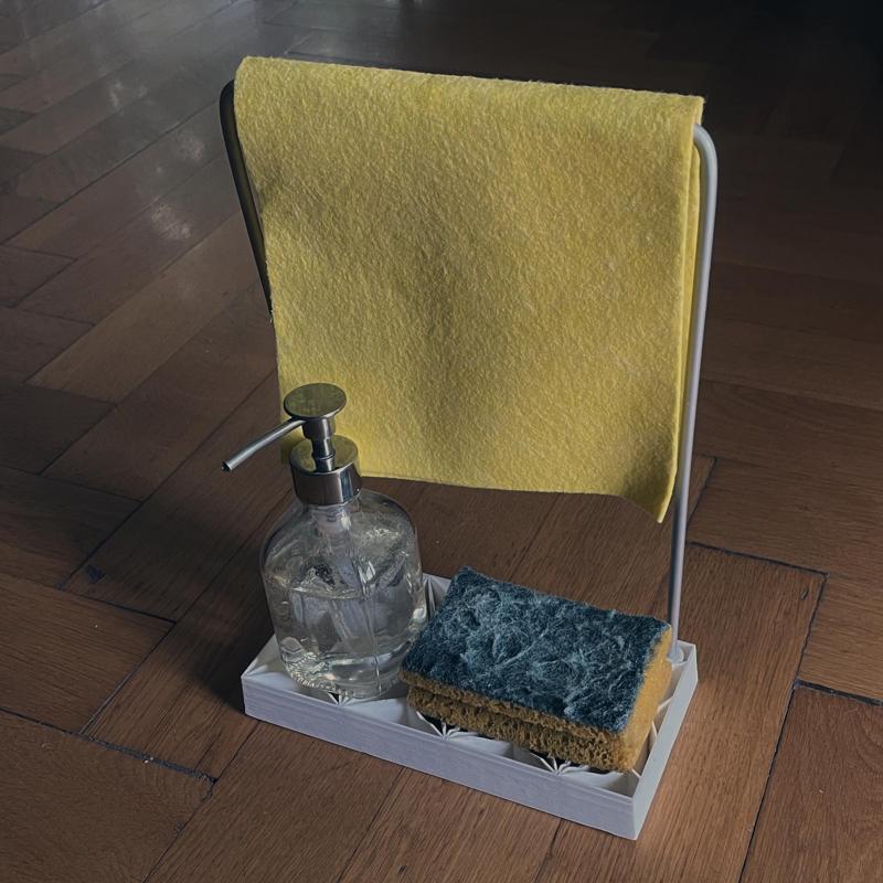 Kitchen base. Sponge, liquid soap and cloth hanger.