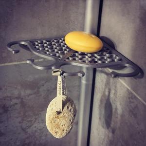 Useful and decorative shower shelf for soap and suspensions