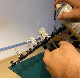 Miniature Grip Handle with Rubber Band Attachment System