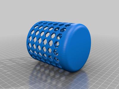 Round pen cup with hexagonal slots