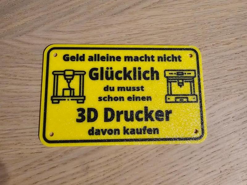 Funny sign Money alone does not make..