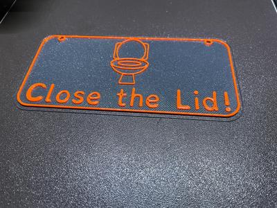 Close the toilet lid sign