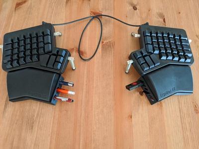 Ergodox EZ Wrist Rest Risers with holders for pens, USBs, SD cards and the all powerful paper clip