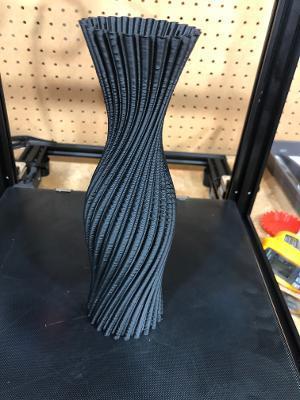Vase with twisted semi circle flutes
