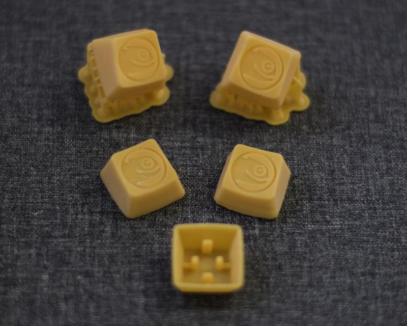 Romer G key cap with OpenSuse logo