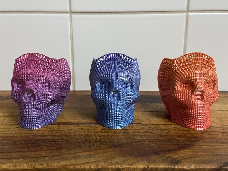Wireframe skull pencil holder