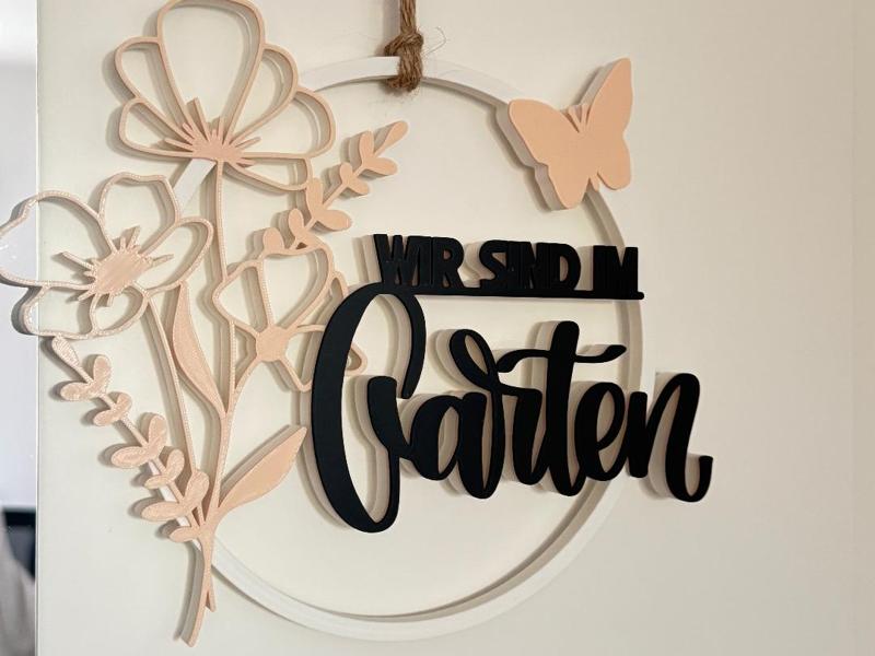 Door decoration We are in the garden