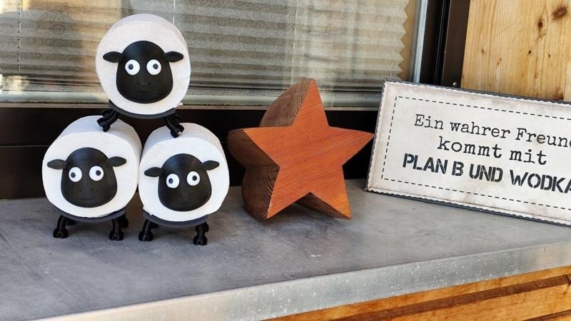 A spare toilet roll holder thats designed to look like a sheep