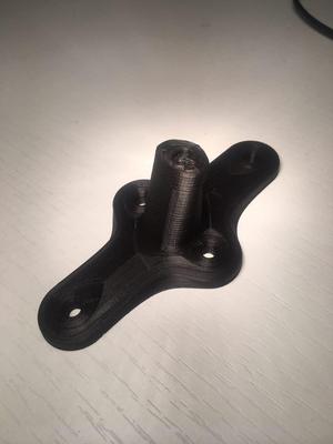 Motorcycle helmet holder