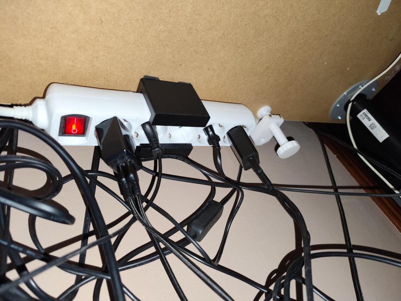 Power strip holder for table