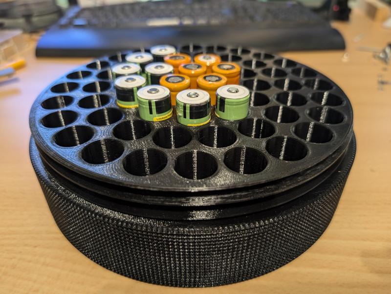 M200 round case for 61 18650 Batteries