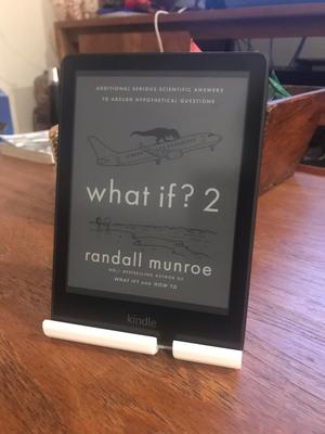 Kindle holder with button space