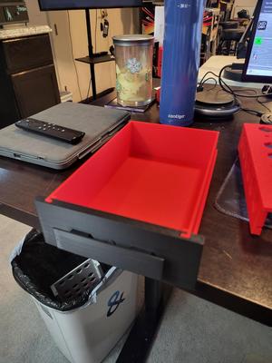 Drawer that mounts under a desk / table top