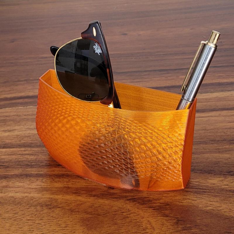 Pen and accessories holder with organic texture