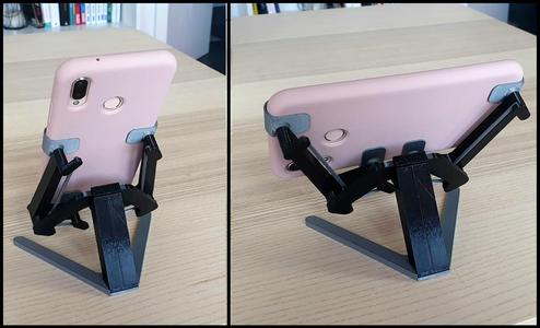 Dual orientation mechanical phone stand