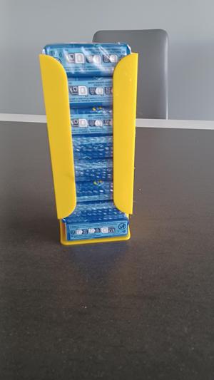 Distributeur de paquets de mouchoirs