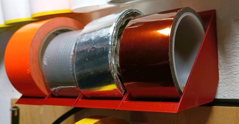 Adhesive tape hodler