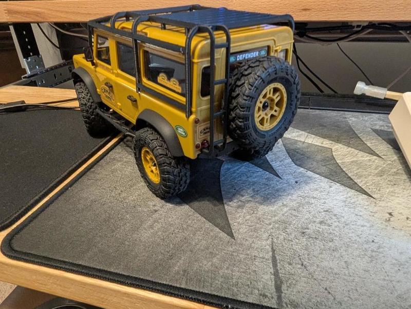 FCX24m defender 110 external roll cage