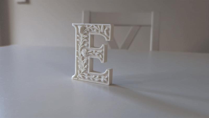 Standing Letter E in a Gypsum Floral Style