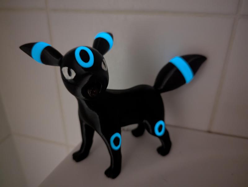 Umbreon Pokemon model glowing split into parts