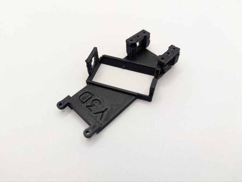 Angled slot/scalextric cradle