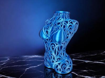 Ornamental vase female figure