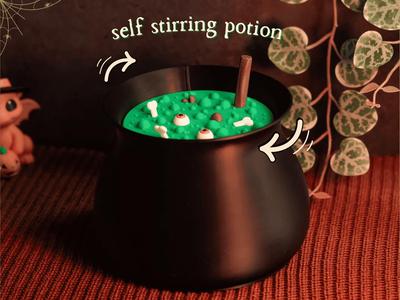 Magic cauldron with self stirring potion
